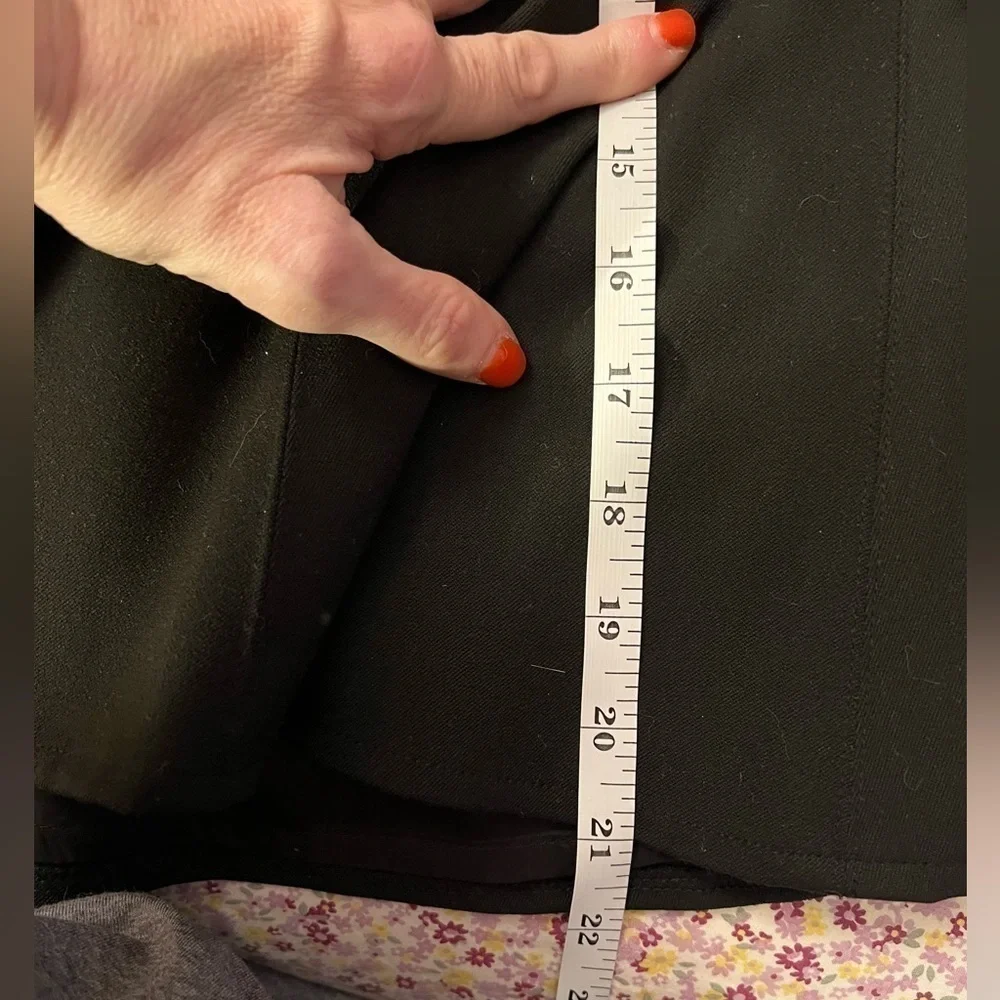 Avenue Montaigne black wool “mermaid” skirt, fully lined. Size 0.